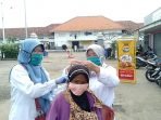 Edukasi Masyarakat Lewat Pembagian 2 Ribu Masker P2TP2A